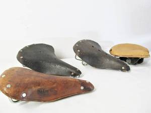 lot 71 image: Lot of 4 Old Vintage Leather Bike Seats