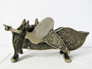 lot 77 image: Ornate Antique Nickel Plated Cast Iron National Package Sealer