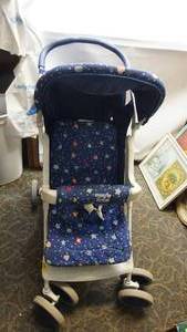 Evenflo Freedom Travel System Stroller With Padded Coverings-Has Two Swivel Front Wheels-Two Back Wheels-Tray On Bottom To Place Misc. Items In It