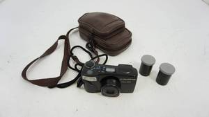 Olympus Camera Zoom 2000-Olympus Lens Zoom 38-70 mm-Two Kodak Max Films In Cases Included-Also Has Carrying Case