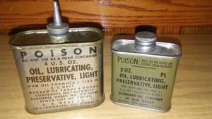 lot 78 image: Military Gun Oil Cans (2)