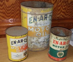 lot 123 image: EN-AR-CO Motor Oil Cans.