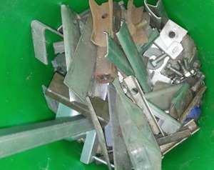 lot 166 image: Menards Bucket of Brackets, Nuts, Bolts, Chain and more.