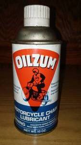 lot 263 image: Oilzum Motorcycle Chain Lubricant.
