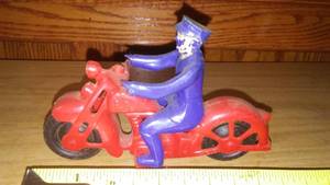 lot 215 image: Vintage Motorcycle and Rider.