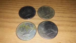 lot 217 image: Kennedy 50 Cent Coins (4)