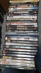 lot 557 image: Previously Viewed DVD Movies (approx. 80)