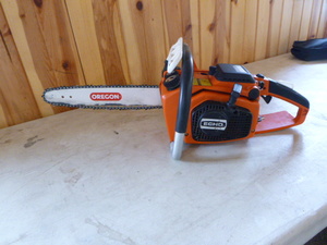 lot 24 image: Echo Chain Saw and Extra Blade