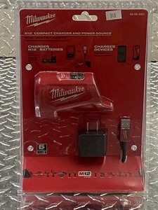 lot 40 image: Milwaukee M12 Compact Charger & Pow...