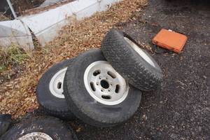 lot 26 image: 4  - Chevy 15 Truck Tires With 6 Bolt Rims