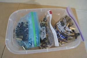 Bin of Empty .45 Colt Casings
