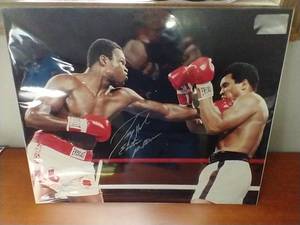 lot 6 image: Autographed Larry Holmes 16x20 Photo - WCOA