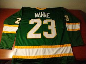 lot 13 image: Autographed Lou Nanne North Stars Jersey - WCOA