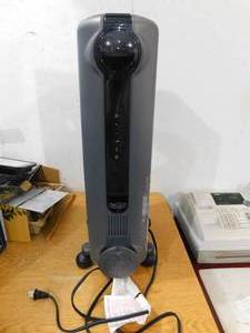 lot 5 image: DeLonghi 1500-Watt Oil-filled Radiant Compact Personal Indoor Electric Space Heater with Thermostat