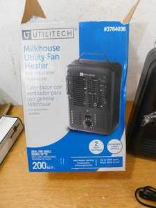 lot 27 image: Utilitech 1500-Watt Utility Fan Utility Indoor Electric Space Heater with Thermostat
