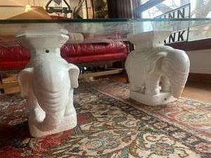 Glass top table with 2 Elephant Supports