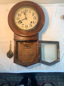 Antique Clock in Wood Case