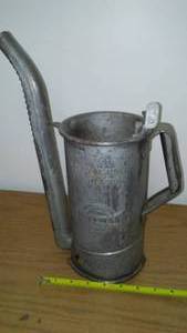 lot 7 image: Huffman Vintage Shop pitcher  galvanized.