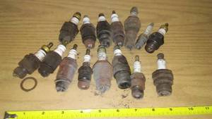 lot 12 image: (15) Vintage Spark Plugs.