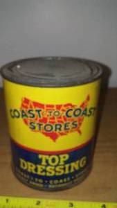 lot 27 image: Coast to coast top dressing can. Empty.