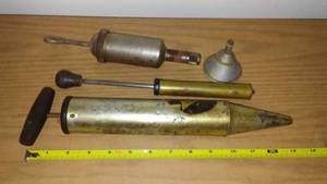 lot 31 image: Vintage automobile cycling tools.