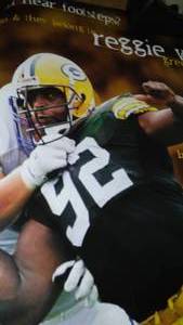 lot 45 image: Reggie White, Green Bay NFL poster.