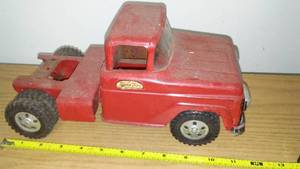 lot 65 image: Vintage Tonka truck- semi. Slightly bent axles.