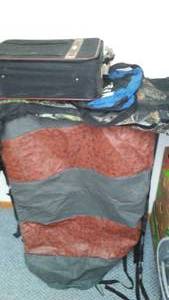 lot 80 image: Camo gear high Cabelas, suitcase and more.