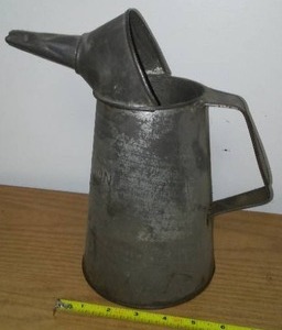 lot 112 image: Vintage half gallon shop pitcher.
