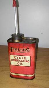 lot 117 image: Phillipss cycling lubricating oil, 8 ounces.