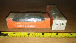 lot 122 image: Harley-Davidson spark plugs. (2) 32344- 74.