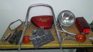 lot 130 image: Miscellaneous motorcycle parts.