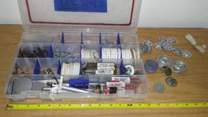 lot 173 image: Tonka hubcaps, white walls, bolts and more.