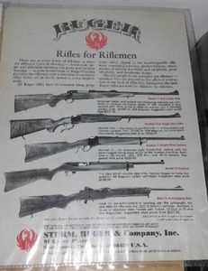 lot 187 image: Hudsons Bay and Ruger advertisements.