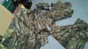 lot 209 image: Camouflage and more. Three pieces L, R and front.