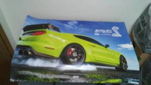lot 228 image: Ford Mustang poster- dealer only.