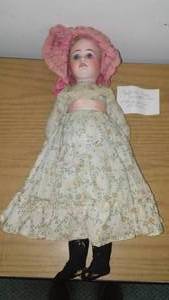 lot 241 image: Antique doll. See all pics.