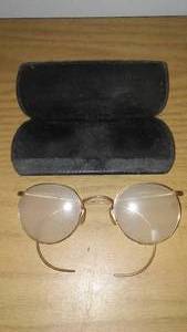 lot 245 image: Antique wire rimmed glasses and case. Gold color