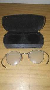 lot 246 image: Antique wire rimmed glasses and case. Silver color