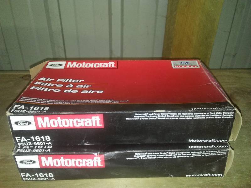 lot 137 image: Motorcraft FA1618 Diesel Air Filter, 2 thermostats, gasket, brackets,