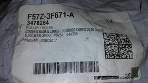 lot 412 image: Genuine Ford F57Z-3F671-A Idler Pulley Bracket