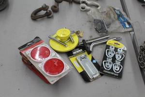 lot 453 image: Lot of (9) Trailer Accessories  - Reflectors, Brinks Commercial Latch, Light Duty D-Rings 4-pack, Ro-Flare Model 18, 1-78 to 2 Lock Plate with Lock and Keys