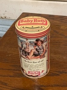 lot 29 image: Variety of Tin Canisters Cadburys Cocoa Essence, Princeton Popcorn Co., Sleepytime Herb Tea, Ferry-Morse Seed Co, Baby Ruth