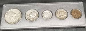 lot 35 image: 1950 US DATE SET IN PLASTIC