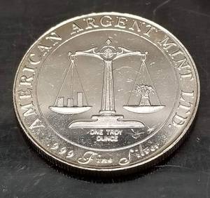 lot 40 image: 1 TROY OZ .999 FINE SILVER WORLD TRADE UNIT