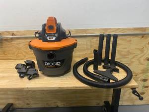 lot 62 image: RIDGID 9 Gal. 18-Volt Cordless WetDry Shop Vacuum (Tool Only) with Filter, Hose and Accessories