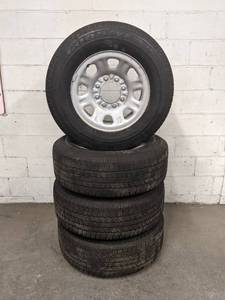 lot 133 image: (Set of 4 Tires) 2017 Goodyear Wrangler SR-A LT26570R18, Load Range E on GM 8x180 Steel Rims