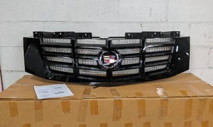 lot 160 image: NEW OPEN BOX - 2007-2014 Cadillac Escalade Grill Insert  Part No. 19156895