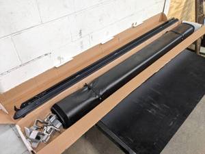 lot 162 image: NEW OPEN BOX - 2014-2019 Chevrolet  GMC 1500-3500 Standard Truck Bed Cover - Part No. 22772362