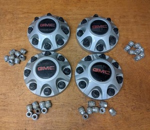 lot 684 image: Set of (4) GMC 8-Bolt Center Caps w Lug Nuts